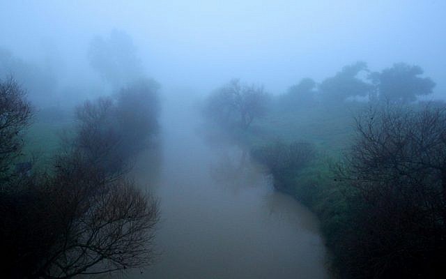 The swollen Jordan River in the Hula Valley on Monday morning. (photo credit: Moshe Shai/Flash90)