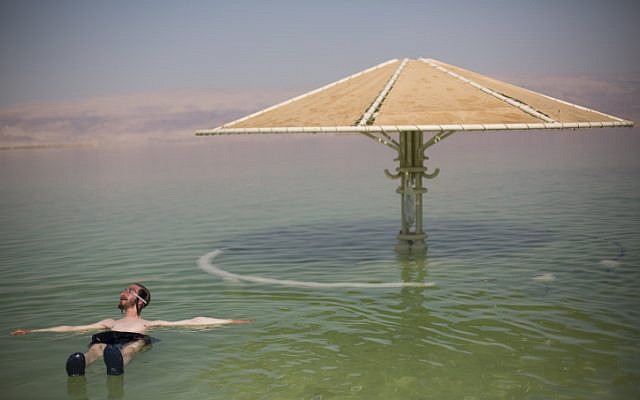 The shrinking Dead Sea received a much needed boost of ten centimeters to water levels following last week's storm (photo credit: Yonatan Sindel/Flash90)