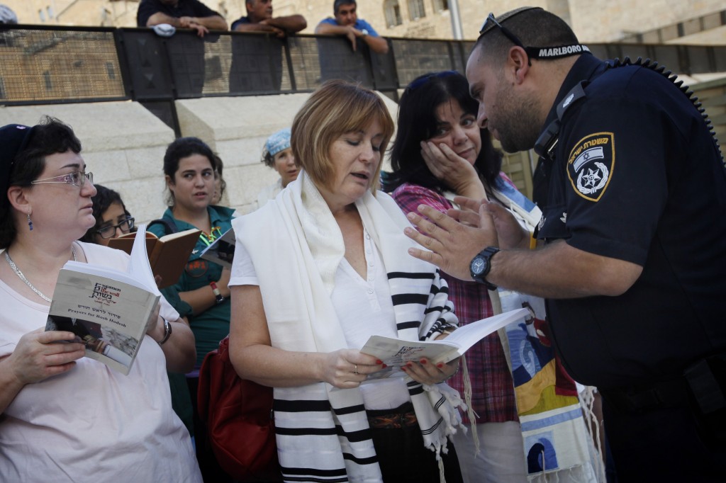 Lesley Sachs, director of 'Women of the Wall,' is confronted by police for wearing a 'tallit' (prayer shawl) at the Western Wall last October (Photo credit: Miriam Alster/FLASH90) Lesley Sachs, director of 'Women of the Wall,' is confronted by police for wearing a 'tallit' (prayer shawl) at the Western Wall last October (Photo credit: Miriam Alster/FLASH90)