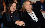 Hatnua's Tzipi Livni shakes hands with Labor Party leader Shelly Yachimovich in November 2012 (photo credit: Yossi Zeliger/Flash90)