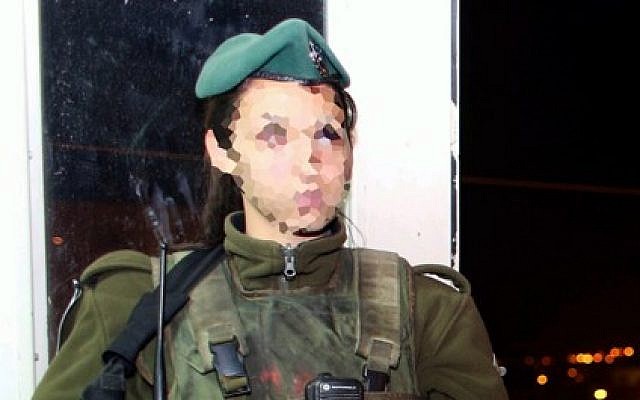 An Israeli border police officer after she shot and killed an armed man in Hebron, December 12, 2012. (photo credit: Oren Nachshon/Flash90)