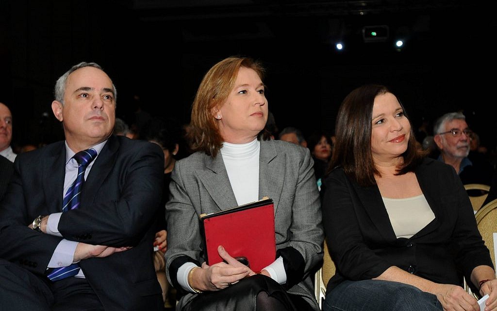 Shelly Yachimovich, head of the Israel Labor party (r), Tzipi Livni, leader of the newly formed Israeli Hatnua party and Israel's Finance Minister Yuval Steinitz listen to a lecture during an economic conference held in Tel Aviv December 25, 2012 (photo credit: Yossi Zeliger/Flash90) Shelly Yachimovich, head of the Israel Labor party (r), Tzipi Livni, leader of the newly formed Israeli Hatnua party and Israel's Finance Minister Yuval Steinitz listen to a lecture during an economic conference held in Tel Aviv December 25, 2012 (photo credit: Yossi Zeliger/Flash90)