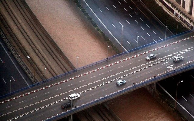 Floods near the Ayalon Highway in Tel Aviv (photo credit: Gideon Markowicz/Flash90)