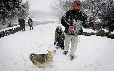 Israelis play in the snow in the Golan Heights (photo credit: Flash90) Israelis play in the snow in the Golan Heights (photo credit: Flash90)