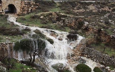 Swirling water flows during flood at a spring near Hapirim River in Gush Etzion, located in the Judean Hills outside Jerusalem. (photo credit: Gershon Elinson/Flash90) Swirling water flows during flood at a spring near Hapirim River in Gush Etzion, located in the Judean Hills outside Jerusalem. (photo credit: Gershon Elinson/Flash90)