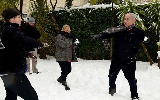 Gearing up for the elections? Prime Minister Benjamin Netanyahu has a snowball fight with his family in Jerusalem on Thursday (photo credit: Avi Ohayon/GPO/Flash90) Gearing up for the elections? Prime Minister Benjamin Netanyahu has a snowball fight with his family in Jerusalem on Thursday (photo credit: Avi Ohayon/GPO/Flash90)