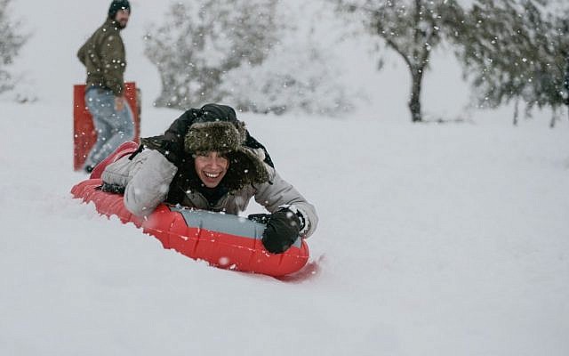 Sledding in Sacher Park, Jerusalem (photo credit: Uri Lenz/Flash 90) Sledding in Sacher Park, Jerusalem (photo credit: Uri Lenz/Flash 90)