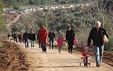 Israelis hiking at Beit Zayit.  Parks across of the country were inundated with tourists taking advantage of a break from last week's rain and snow (photo credit: Yonatan Sindel/Flash90)