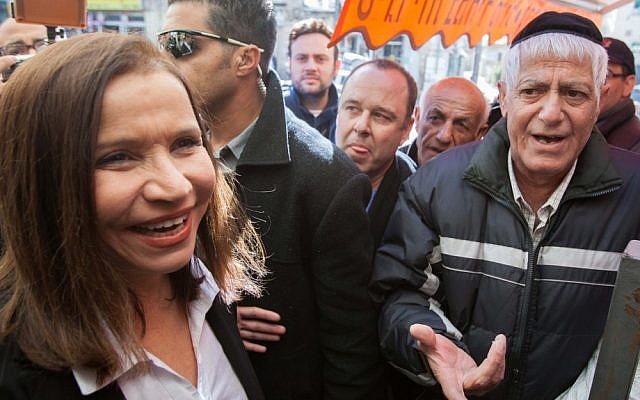 Labor party chief Shelly Yachimovich makes a campaign stop at Jerusalem's Mahane Yehuda market on Wednesday (photo credit: Yonatan Sindel/Flash90)