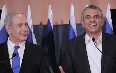 Prime Minister Benjamin Netanyahu and former Communications Minister Moshe Kahlon at a press conference that was banned from broadcast by the elections committee. Netanyahu announced Kahlon as newly appointed head of the Israel Lands Administration. January 20, 2013. (photo credit: Miriam Alster/FLASH90)