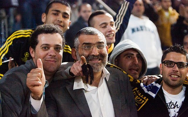 Otzma Leyisrael #2 Michael Ben Ari attends a soccer game between Beitar Jerusalem and Hapoel Tel Aviv on Monday evening, the day before Israeli elections. (photo credit: Roy Alima/Flash90) Otzma Leyisrael #2 Michael Ben Ari attends a soccer game between Beitar Jerusalem and Hapoel Tel Aviv on Monday evening, the day before Israeli elections. (photo credit: Roy Alima/Flash90)