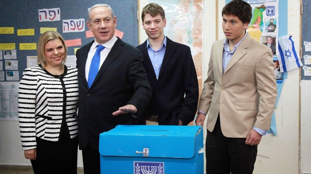 Prime Minister Benjamin Netanyahu, his wife Sara and their sons Avner and Yair cast their votes at a polling station in Jerusalem on January 22, 2013. (Photo credit: Marc Israel Sellem/POOL/FLASH90) Prime Minister Benjamin Netanyahu, his wife Sara and their sons Avner and Yair cast their votes at a polling station in Jerusalem on January 22, 2013. (Photo credit: Marc Israel Sellem/POOL/FLASH90)