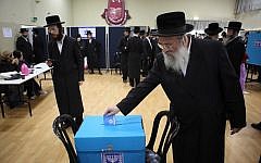An ultra-Orthodox man casts his vote in the town of Bnei Brak, Tuesday, January 22, 2013. (photo credit: Yaakov Naumi/Flash90)