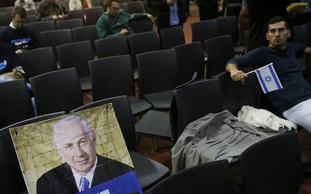 The reduced ranks of Likud supporters react to the TV exit polls, January 22, 2013. (Photo credit: Miriam Alster/FLASH90)