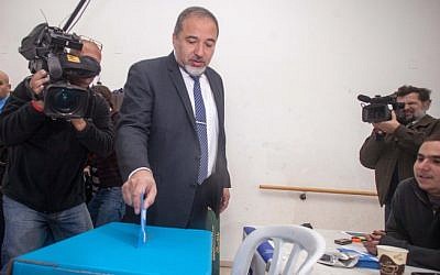 Avigdor Liberman (Yisrael Beytenu) casts his vote Tuesday (photo credit: Flash90) Avigdor Liberman (Yisrael Beytenu) casts his vote Tuesday (photo credit: Flash90)