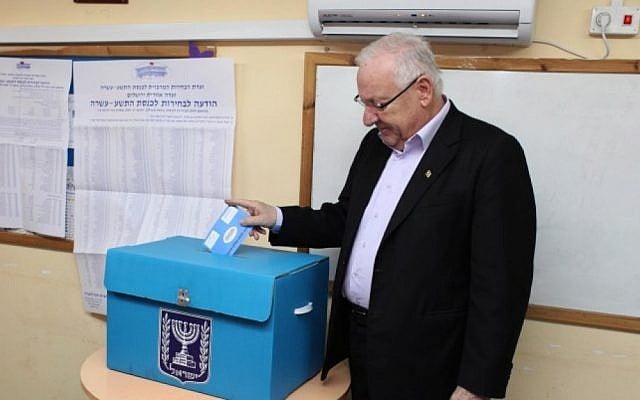 Reuven Rivlin casts his ballot on Tuesday (photo credit: Yoav Ari Dudkevitch/Flash90)