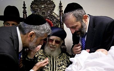 From left: Eli Yishai, Rabbi Ovadia Yosef and Aryeh Deri, the leaders of the ultra-Orthodox Shas party attend a circumcision in January, 2013. (photo credit: Yonatan Sindel/Flash90)