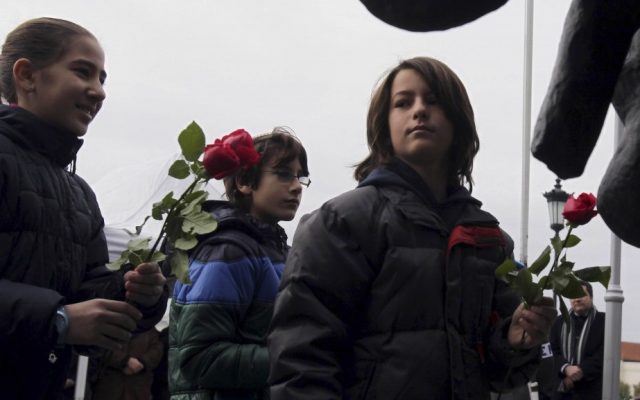 Greek children place flowers at the Holocaust Memorial commemorating the persecution of the Jewish people during World War II, in Thessaloniki, Sunday (photo credit: Nikolas Giakoumidis/AP) Greek children place flowers at the Holocaust Memorial commemorating the persecution of the Jewish people during World War II, in Thessaloniki, Sunday (photo credit: Nikolas Giakoumidis/AP)