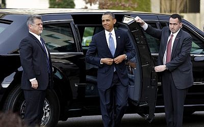 US President Barack Obama smiles as he arrives at St. John's Church in Washington, Monday, Jan. 21, 2013, for a church service during the 57th Presidential Inauguration (photo credit: AP/Jacquelyn Martin)