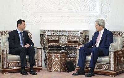Syrian President Bashar Assad meets with Sen. John Kerry (D-MA), President Barack Obama's choice to become the next secretary of state, in Damascus, Syria in 2010. (photo credit: AP/SANA)