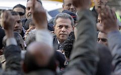 Popular Egyptian TV presenter Tawfiq Okasha is greeted by his supporters as he arrives at the Cairo South court in Cairo Egypt, on Tuesday, January 8, 2013. (photo credit: AP Photo/Amr Nabil) Popular Egyptian TV presenter Tawfiq Okasha is greeted by his supporters as he arrives at the Cairo South court in Cairo Egypt, on Tuesday, January 8, 2013. (photo credit: AP Photo/Amr Nabil)