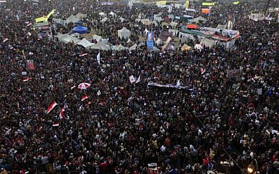 Thousands of Egyptian protesters gather in Tahrir Square, Cairo, Egypt, Friday, January 25 (photo credit: AP/Khalil Hamra)