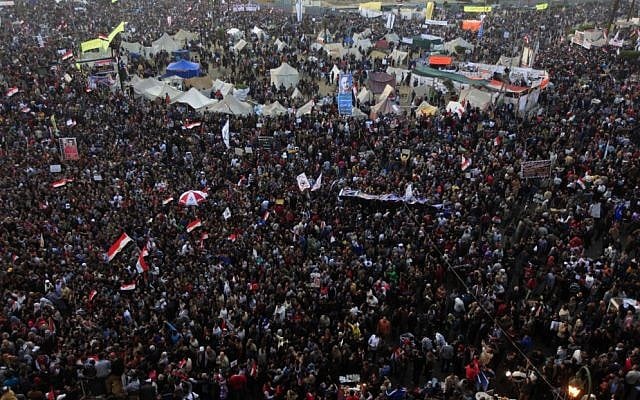 Thousands of Egyptian protesters gather in Tahrir Square, Cairo, Egypt, Friday, January 25 (photo credit: AP/Khalil Hamra) Thousands of Egyptian protesters gather in Tahrir Square, Cairo, Egypt, Friday, January 25 (photo credit: AP/Khalil Hamra)