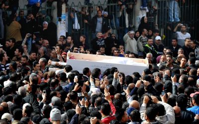 Egyptians carry the coffin of a man killed during a mass funeral in Port Said, Egypt, on Sunday, January 27, 2013. (photo credit: AP Photo)