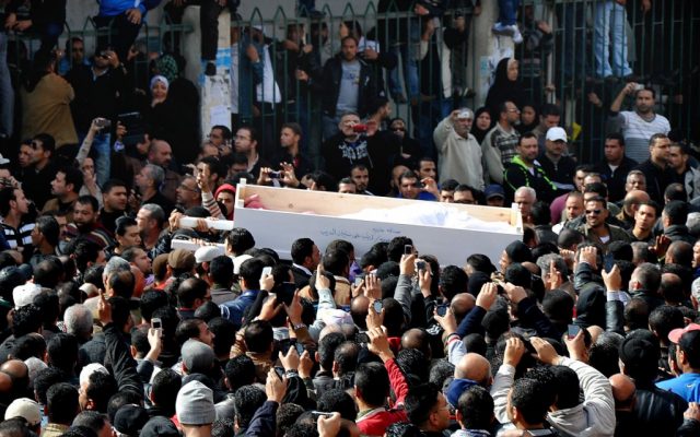 Egyptians carry the coffin of a man killed during a mass funeral in Port Said, Egypt, on Sunday, January 27, 2013. (photo credit: AP Photo)