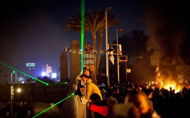 Protesters clash with security forces near Tahrir Square in Cairo, Egypt, on Sunday, January 27, 2013 (photo credit: AP/Virginie Nguyen Hoang)