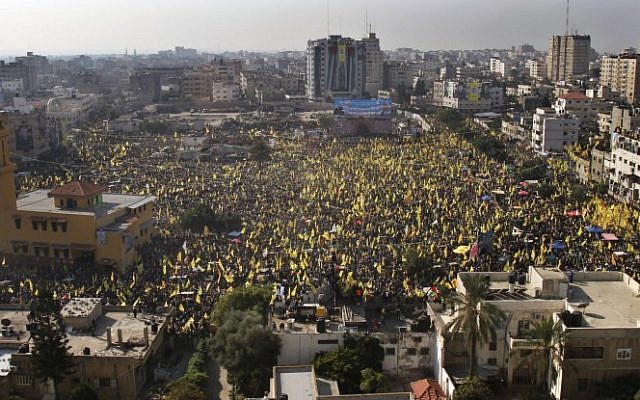 Tens of thousands of Fatah supporters rallying in Gaza City Friday. (photo credit: AP/Adel Hana)