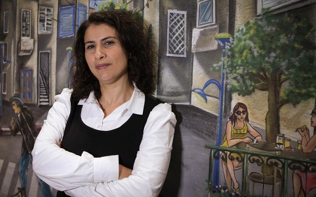 Asma Aghbaria-Zahalka, the head of the Daam party, poses for a photograph in Tel Aviv on Thursday. (photo credit: AP/Dan Balilty) Asma Aghbaria-Zahalka, the head of the Daam party, poses for a photograph in Tel Aviv on Thursday. (photo credit: AP/Dan Balilty)