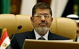 Egyptian President Mohammed Morsi attends the third session of the Arab Economic Summit, in Riyadh, Saudi Arabia, Monday, January 21, 2013. (photo credit: AP)