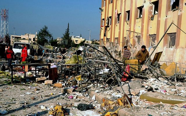 The site of an explosion in Aleppo, Syria, Tuesday, January 15, 2013 (photo credit: AP/SANA)