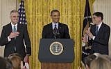 US President Barack Obama with the White House's then-Chief of Staff Jack Lew, right, announces that he will name current Deputy National Security Adviser Denis McDonough,left, as his next chief of staff, Friday, Jan. 25, 2013, in the East Room of the White House in Washington. (photo credit: AP/Carolyn Kaster)