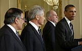 President Barack Obama speaks in the East Room of the White House in Washington on Monday to announce his nomination of John Brennan, second from the right, as the new CIA director, and former Nebraska senator Chuck Hagel, second from the left, as the new Defense Secretary. (photo credit: AP/Pablo Martinez Monsivais)