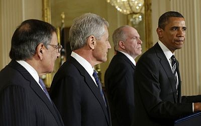 President Barack Obama speaks in the East Room of the White House in Washington on Monday to announce his nomination of John Brennan, second from the right, as the new CIA director, and former Nebraska senator Chuck Hagel, second from the left, as the new Defense Secretary. (photo credit: AP/Pablo Martinez Monsivais)