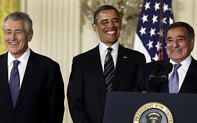 President Barack Obama and his choice for defense secretary, former Nebraska senator Chuck Hagel, left, and Leon Panetta in the East Room of the White House, January 7, 2013 (photo credit: Charles Dharapak/AP)