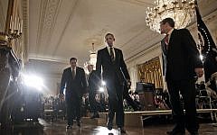US President Barack Obama, center, walks away from the stage in the East Room of the White House in Washington, Monday, Jan. 7, 2013, after announcing that he is nominating Deputy National Security Adviser for Homeland Security and Counterterrorism, John Brennan, second from the left, as the new head of the CIA. (photo credit: Pablo Martinez Monsivais/AP)