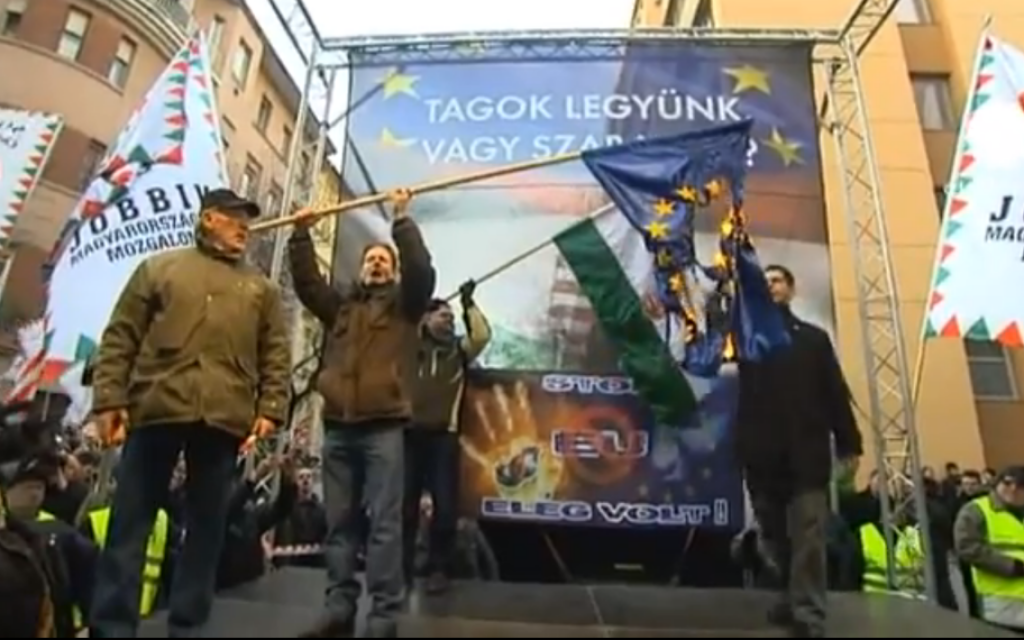 Jobbik party supporters burning an EU flag at a rally in Budapest in 2012. (screen capture/YouTube) Jobbik party supporters burning an EU flag at a rally in Budapest in 2012. (screen capture/YouTube)