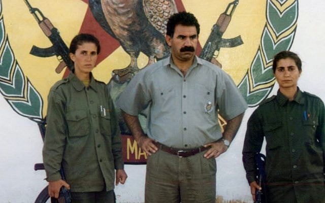 PKK leader Abdullah Ocalan, center, flanked by fellow rebels. (AP/IHA)