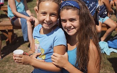 Proponents of Jewish summer camp claim the experience increases the likelihood that kids will light Shabbat candles and attend synagogue. (Courtesy of the Foundation for Jewish Camp via JTA) Proponents of Jewish summer camp claim the experience increases the likelihood that kids will light Shabbat candles and attend synagogue. (Courtesy of the Foundation for Jewish Camp via JTA)