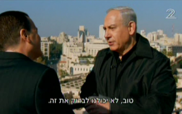 Prime Minister Benjamin Netanyahu speaks with Channel 2's Yaakov Elon on Monday. (photo credit: image capture from Channel 2)