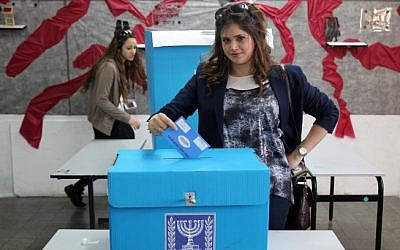 A woman casts her vote in the Jewish settlement of Beitar Illit (photo credit: Nati Shohat/Flash90) A woman casts her vote in the Jewish settlement of Beitar Illit (photo credit: Nati Shohat/Flash90)