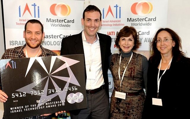 The KitLocate team accepts its $25,000 prize (Photo credit: Courtesy)