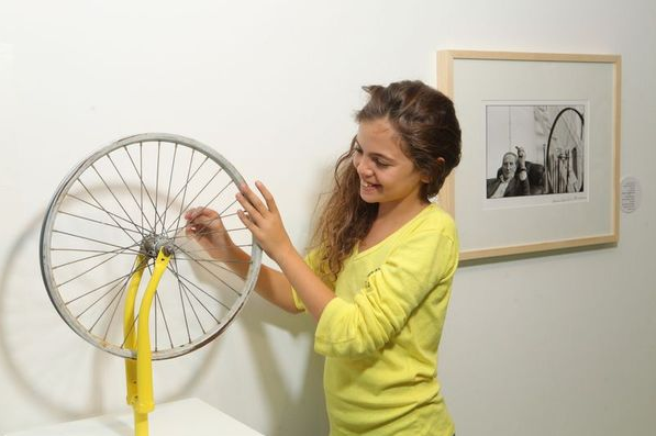 Checking out the bikes at the kids' exhibit in the main hall of the Tel Aviv Museum of Art (Courtesy Tel Aviv Museum of Art)
