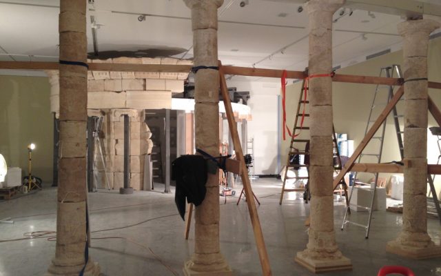 A look at the reconstructed columns that were moved from Herodium to the museum, and the outer wall of the circular mausoleum (photo credit: Jessica Steinberg/Times of Israel)