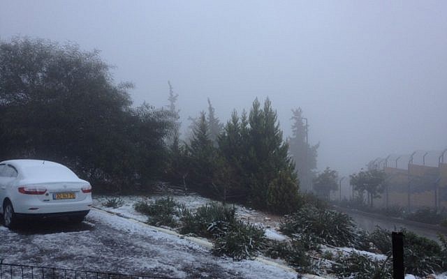 Heavy fog covering Route 443, as seen from the settlement of Beit Horon. (photo credit: Joshua Davidovich/Times of Israel staff)