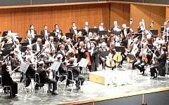 Gustavo Dudamel conducting the Israel Philharmonic in Jerusalem last week, at the International Convention Center (photo credit: Jessica Steinberg/Times of Israel)