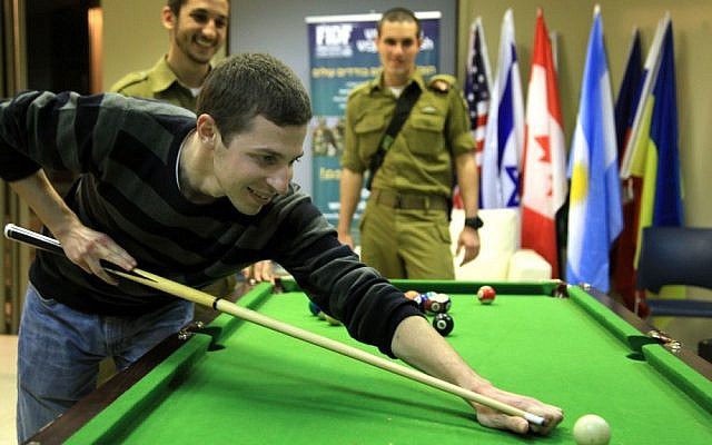 Gilad Shalit meets with lone soldiers in Jerusalem on Thursday (photo credit: Sasson Tiram/Nefesh B’Nefesh)